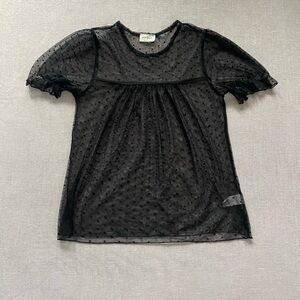 Free Kisses black sheer polka dot top.